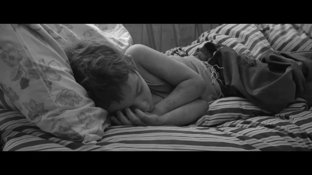 Rural childhood scene from Woodkid’s The Golden Age music film featuring Max Richter