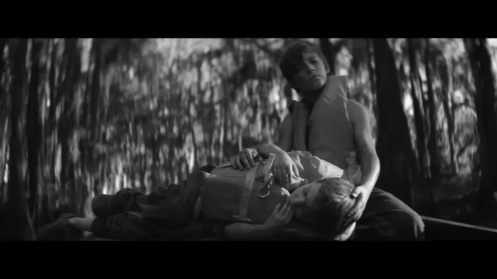 Young figures in the countryside during Woodkid’s The Golden Age film with Max Richter
