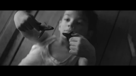 Young boy in Woodkid’s black-and-white video for The Golden Age featuring Max Richter’s Embers