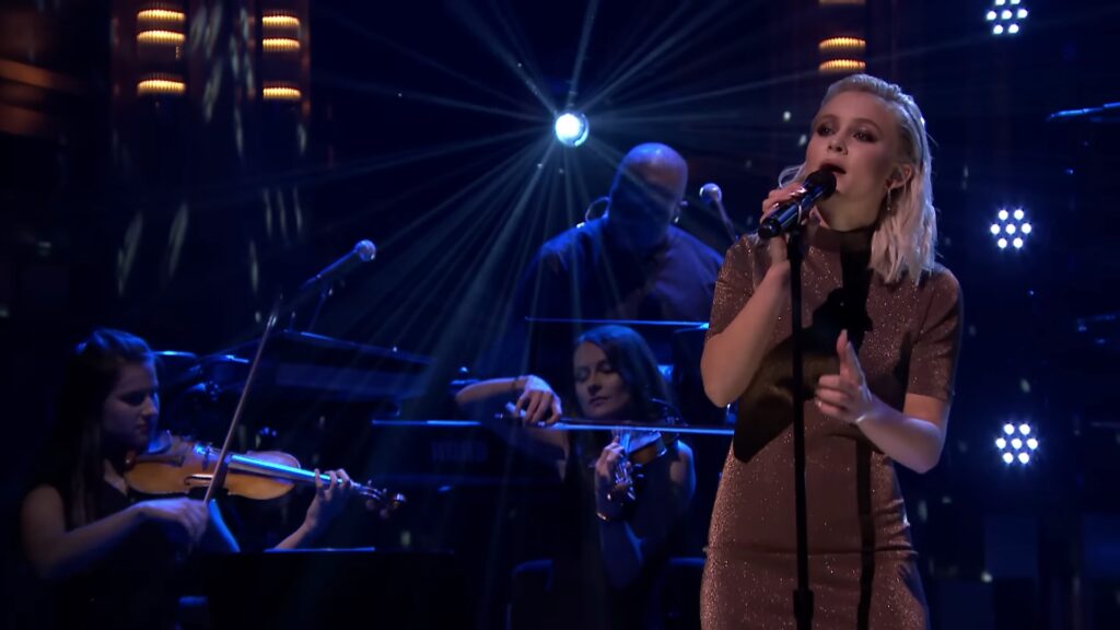 Zara Larsson performs center stage with full band and string section during Never Forget You on The Tonight Show