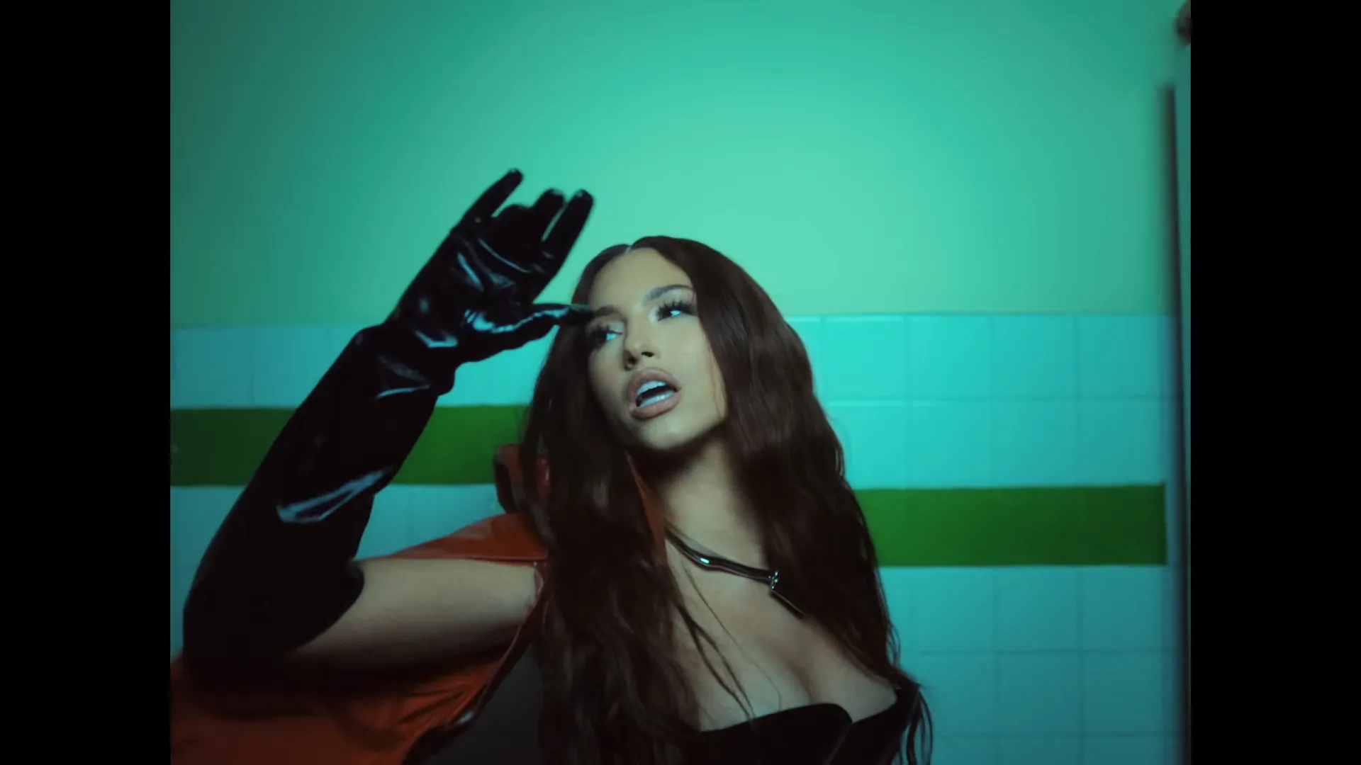 Rêve singing in the Contemporary Love official video, from her Saturn Return era.