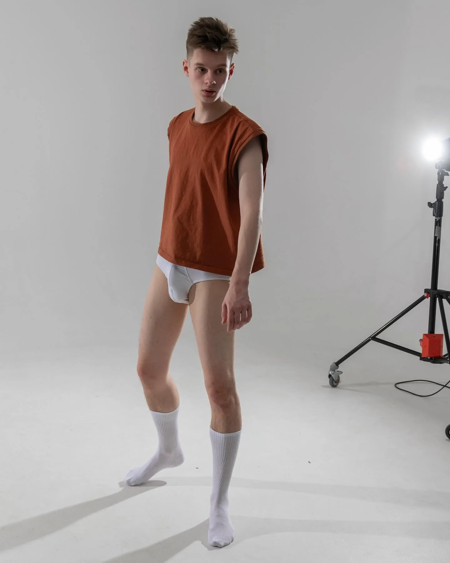 Gleb Smirnov posing in a clean menswear-style lookbook image