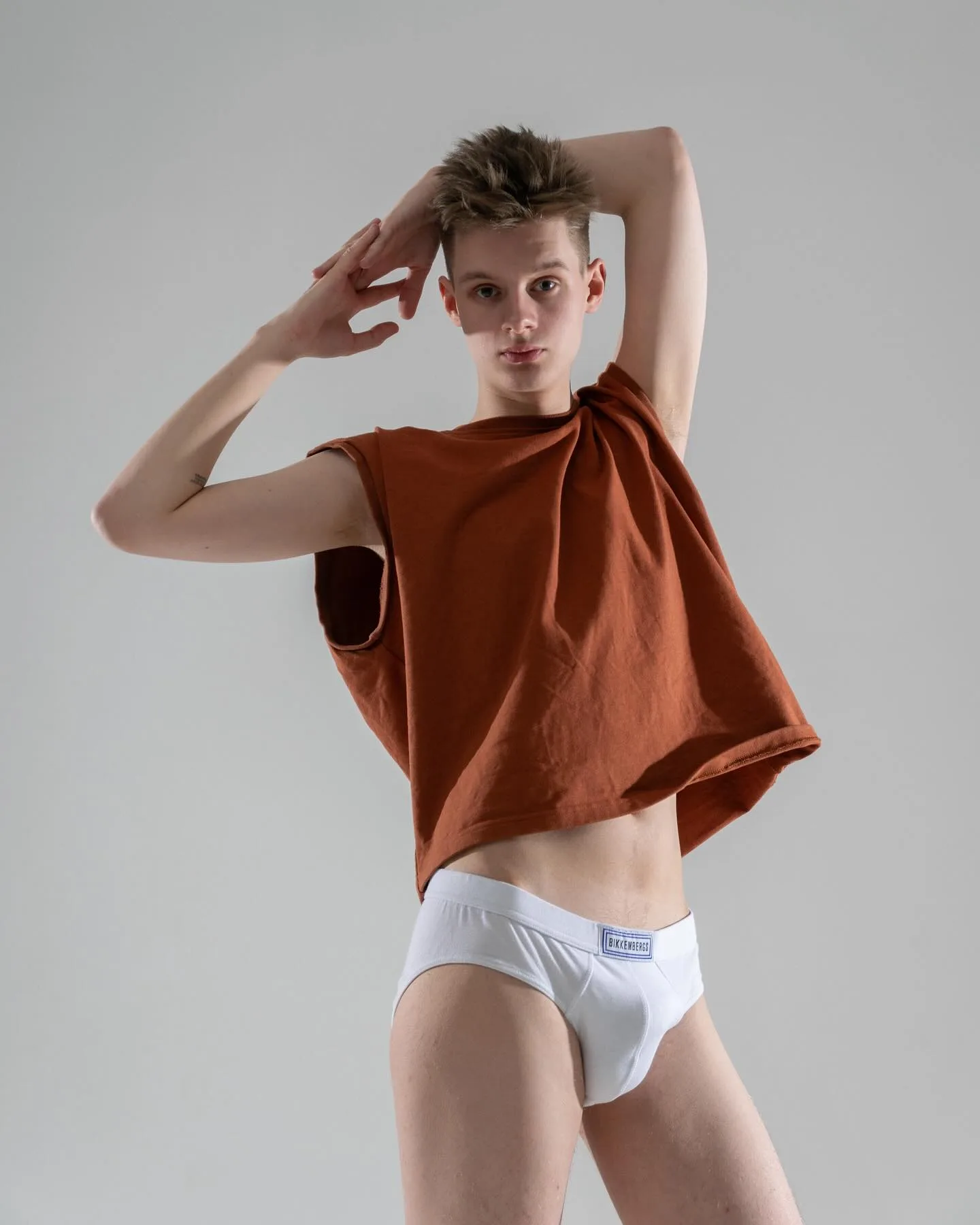 Gleb Smirnov in a clean fashion lookbook photographed by Alex Archangelskii