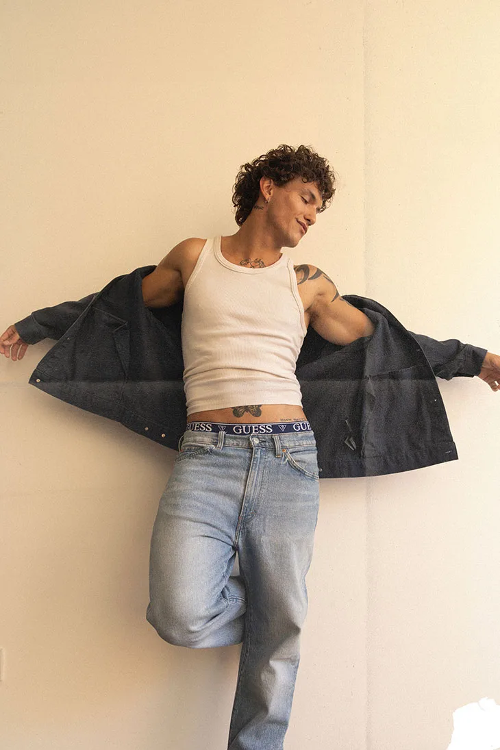 Model Ivan Couture posing in a clean portrait by Yeu Sanchez.
