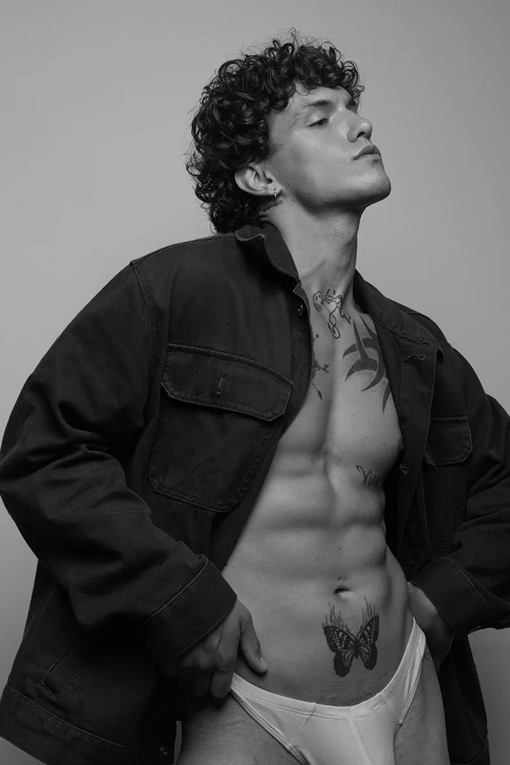 Ivan Couture in a clean fashion portrait for MMSCENE by Yeu Sanchez.