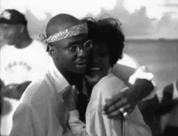Whitney Houston teasing Bobby Brown loving embrace