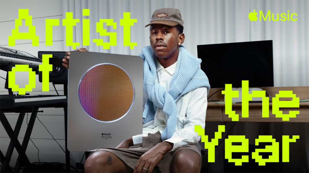 Tyler, The Creator holding Apple Music Artist of the Year award 2025
