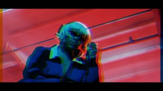 KaMillion performing in the colorful I Heart Banana music video