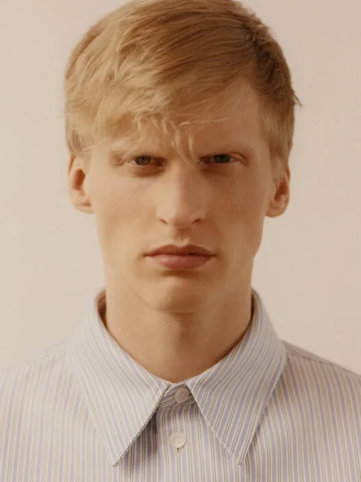 Model Marcin Smorawiński photographed by Greg Mikrut in a stripped-back studio portrait