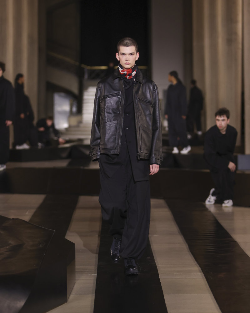 Model wearing Y‑3 FW26 runway look at Palais d’Iéna