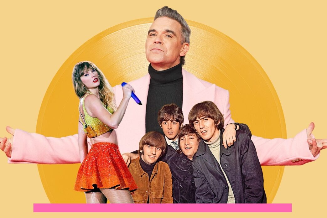 Robbie Williams celebrating his record‑breaking 16th U.K. No. 1 album