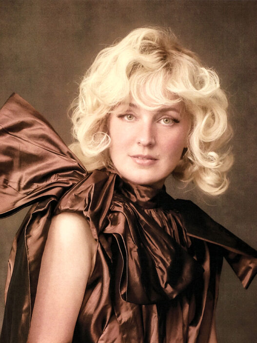 Cam performing or posing for the All Things Light era