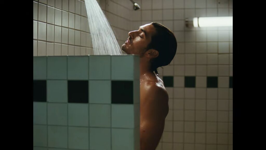 Taylor Zakhar Perez relaxing under a warm shower stream during the Lacoste campaign