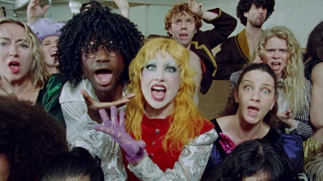 Haute & Freddy performing in the Dance The Pain Away video