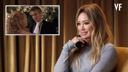 Hilary Duff rewatching scenes from her classic roles during a Vanity Fair interview.