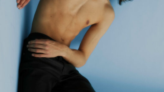 Model Mark Zymaroiev photographed by Jacek Szopik in a clean, soft‑lit editorial for FY! Online