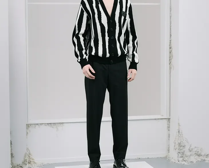UNDERCOVER Pre‑Fall 2026 menswear look featuring refined minimalist tailoring and contemporary wardrobe staples.