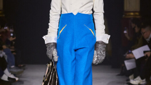 Model wearing Wooyoungmi FW26 winter‑inspired runway look