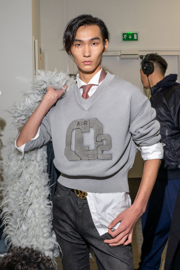 Model being prepped backstage at Doublet FW26 — photo by Edward Wendt (via FY)