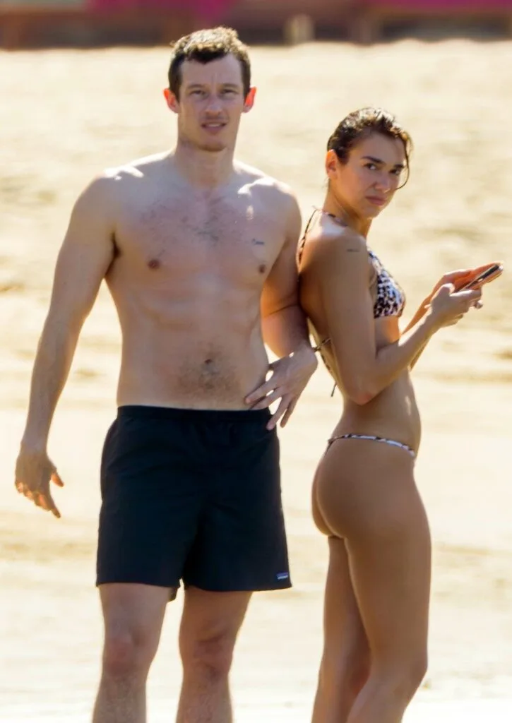Dua Lipa and Callum Turner photographed together at the beach