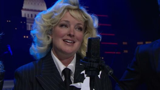 Cam performing an intimate acoustic rendition of “Slow Down”