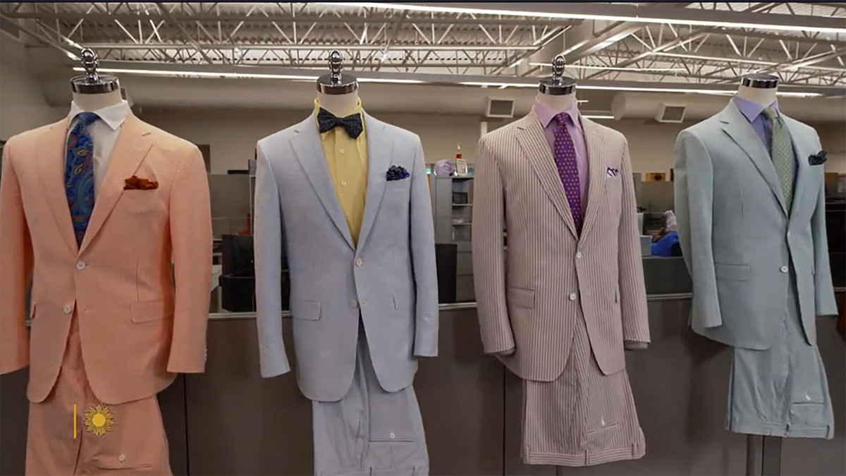 New Orleans locals wearing seersucker suits in various colors and styles