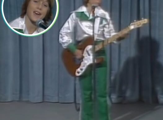 Teenage Keith Urban performing on the Jimmy Hannan Show in 1983 with guitar in hand.