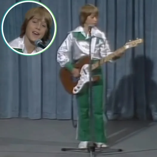 Teenage Keith Urban performing on the Jimmy Hannan Show in 1983 with guitar in hand.