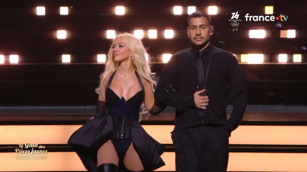 Christina Aguilera delivering a controlled vocal performance during Le Gala des Pièces Jaunes in Paris
