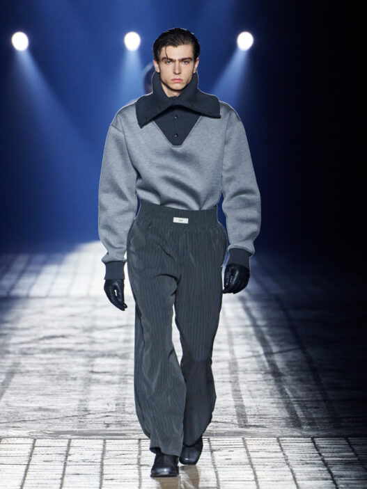 Model wearing structured outerwear from GmbH’s FW26 collection