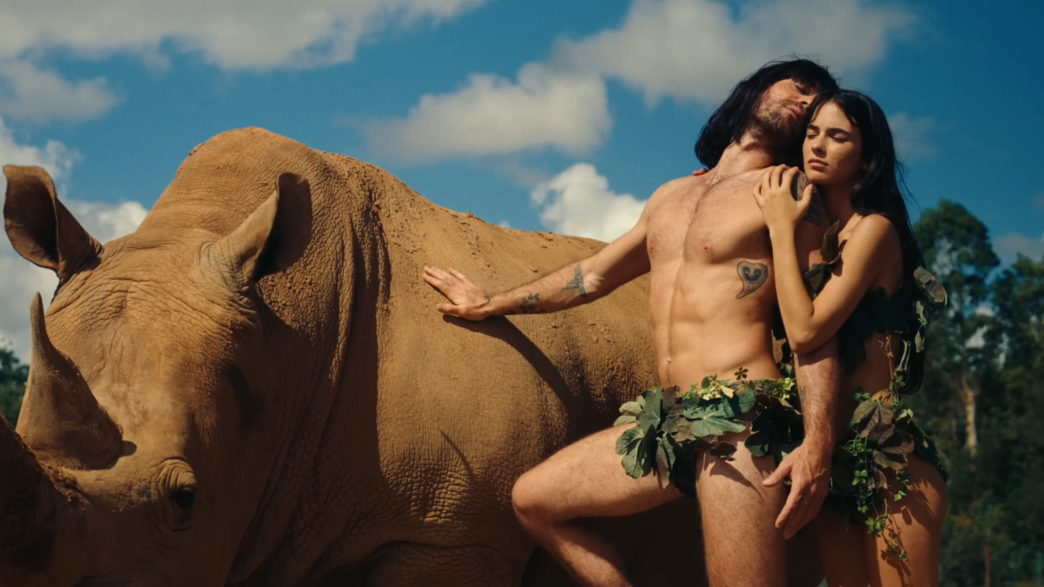 KJ Apa as Mr. Fantasy in his rainforest‑themed “One Last Night” music video.