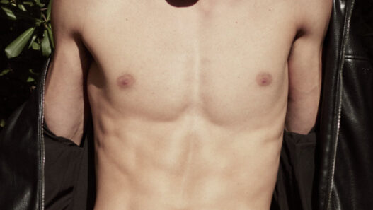 Hugo Salgado photographed by Carlos Venegas in a fresh‑faced, modern portrait editorial