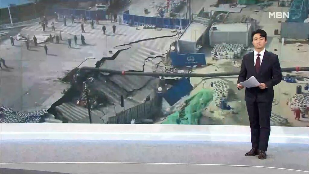 Large sinkhole left behind after a road collapse at a Shanghai construction site from a local news report
