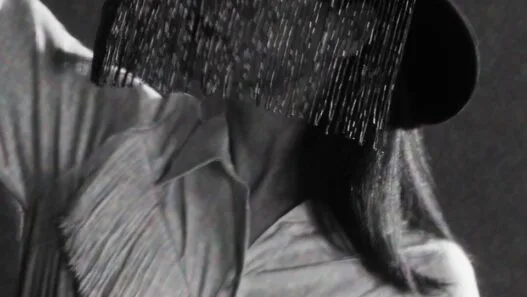 Jessie Ware in a still from the minimalist black‑and‑white visualizer for her single “Ride.”