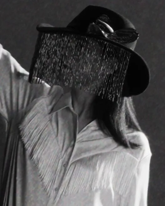 Jessie Ware in a still from the minimalist black‑and‑white visualizer for her single “Ride.”