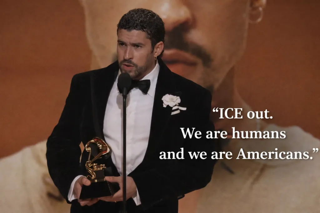 Bad Bunny stands at the microphone holding his Grammy Award while delivering his acceptance speech condemning ICE