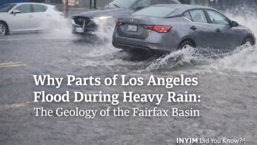 Cars drive through deep floodwater on Melrose Avenue in Los Angeles during heavy rain, highlighting stormwater pooling in the Fairfax Basin.