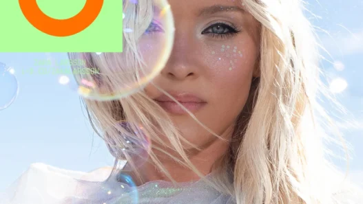 Zara Larsson in a sheer Ludovic de Saint Sernin SS26 lace gown for i‑D Magazine, photographed by Yasmine Diba.