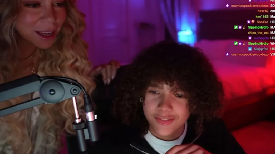 Mariah Carey smiling while appearing briefly on her son’s Twitch livestream