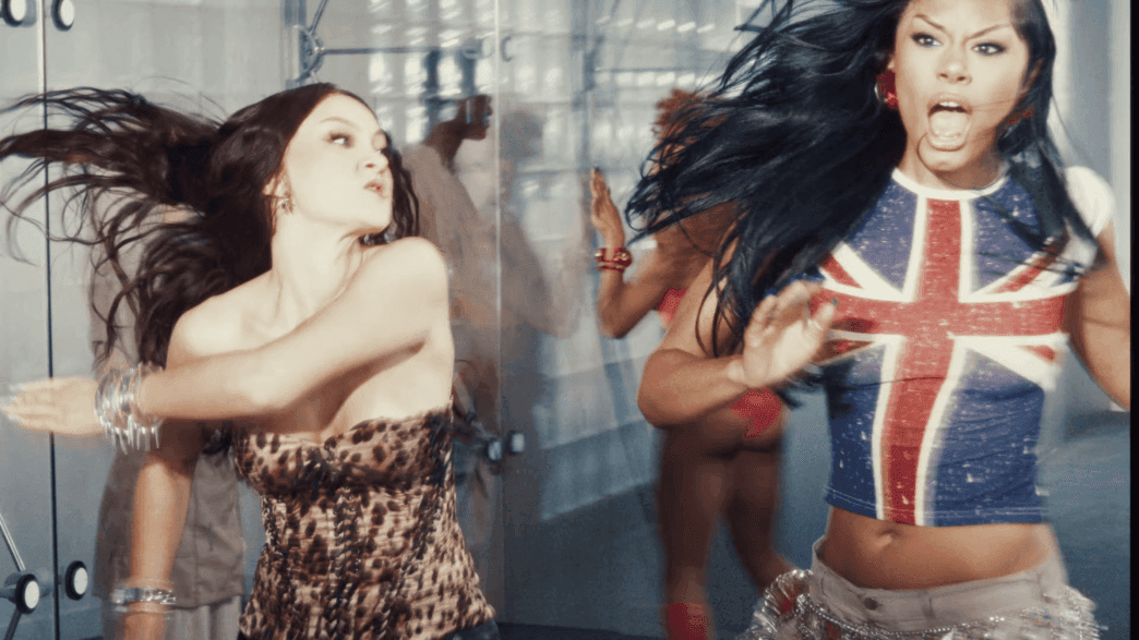FLO fight scene in a sleek, high‑fashion scene from the “Leak It” music video.