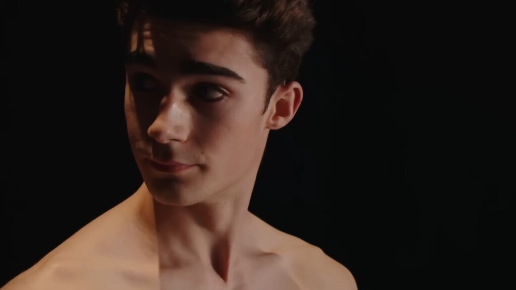 William GYVES performing his first‑prize contemporary variation at the Prix de Lausanne 2026, captured in a dynamic mid‑movement screenshot.
