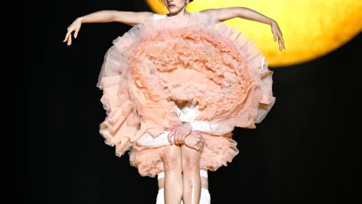 Rosalía performing on opening night of the LUX Tour 2026 in Lyon with ballet‑inspired choreography.