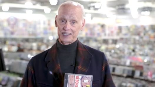 John Waters browsing records at Amoeba Music for “What’s In My Bag?”