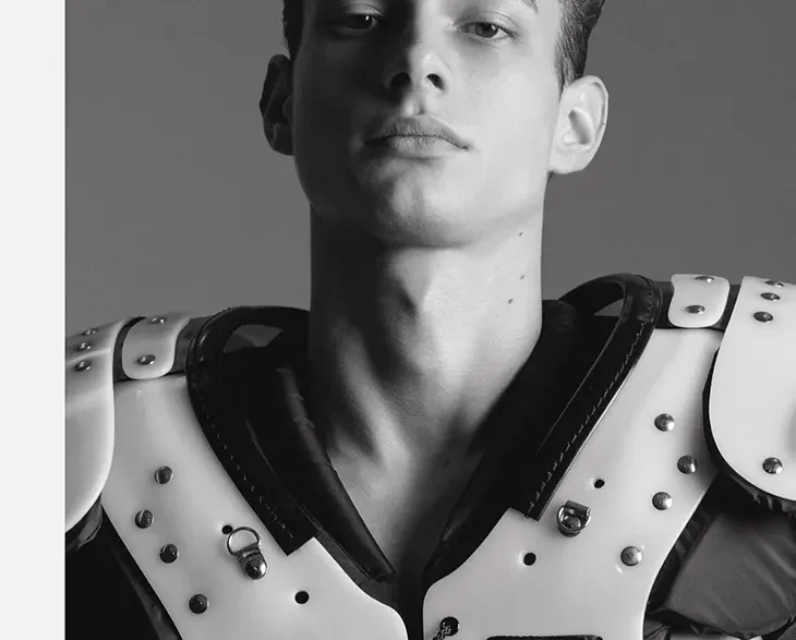 Model Juan Orghici posing in a sculptural studio editorial shot by Lucas Lei for MMSCENE Style Stories.