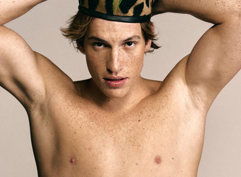 Models Jonas Casademunt and Jason Wu in a warm studio editorial photographed by Oscar Ceja.