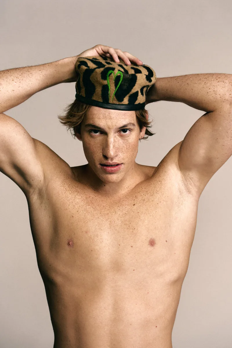 Models Jonas Casademunt and Jason Wu in a warm studio editorial photographed by Oscar Ceja.