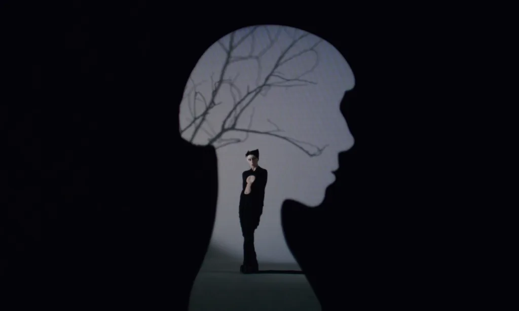 Rare DM in a cinematic scene from the Compliment music video