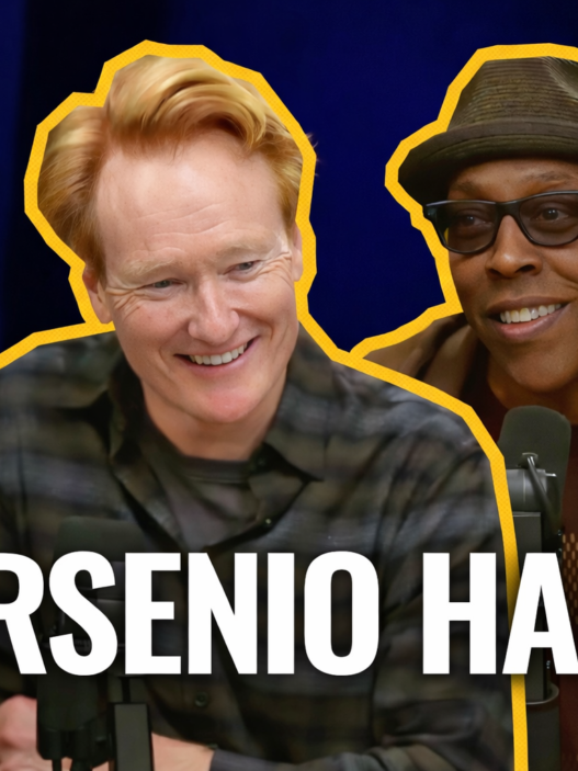 Arsenio Hall speaking into a microphone with Conan O’Brien during a Conan O’Brien Needs a Friend podcast episode