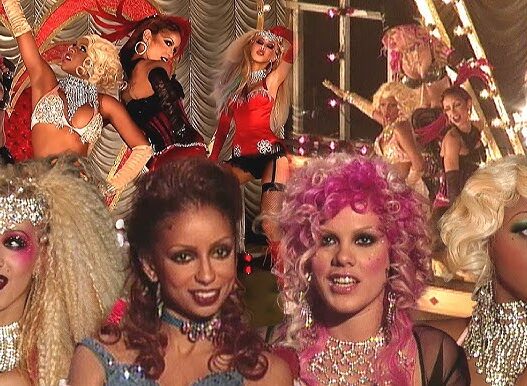 Christina Aguilera, Pink, Lil’ Kim, and Mýa appear in rare behind‑the‑scenes ET footage from the 2001 “Lady Marmalade” video shoot.
