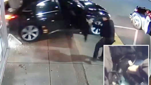 Police body‑cam showing officer trapped inside a suspect’s getaway vehicle.